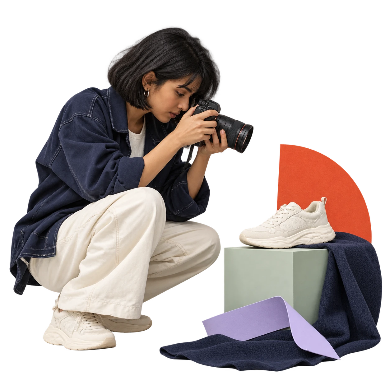 A streetwear creator photographing a cream sneaker.